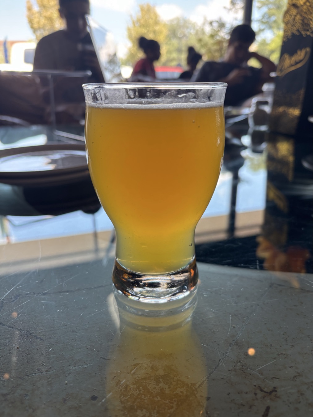 A golden pour of Tangerine Vanilla Paleta Weiss at Fortunate Son.